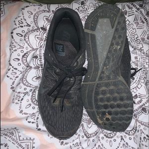 Black Nike running shoes